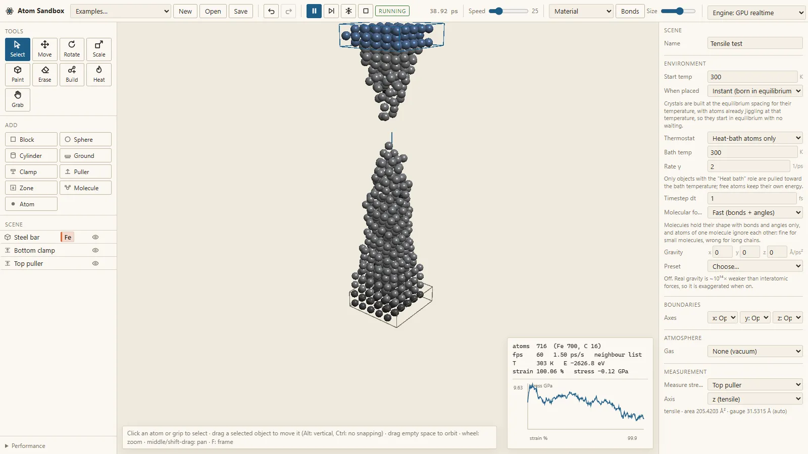 The iron bar broken in two: a cone of atoms hanging from the blue puller above and a cone standing on the clamp below